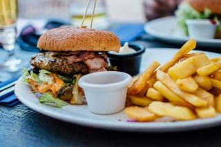 photo of a burger and fries