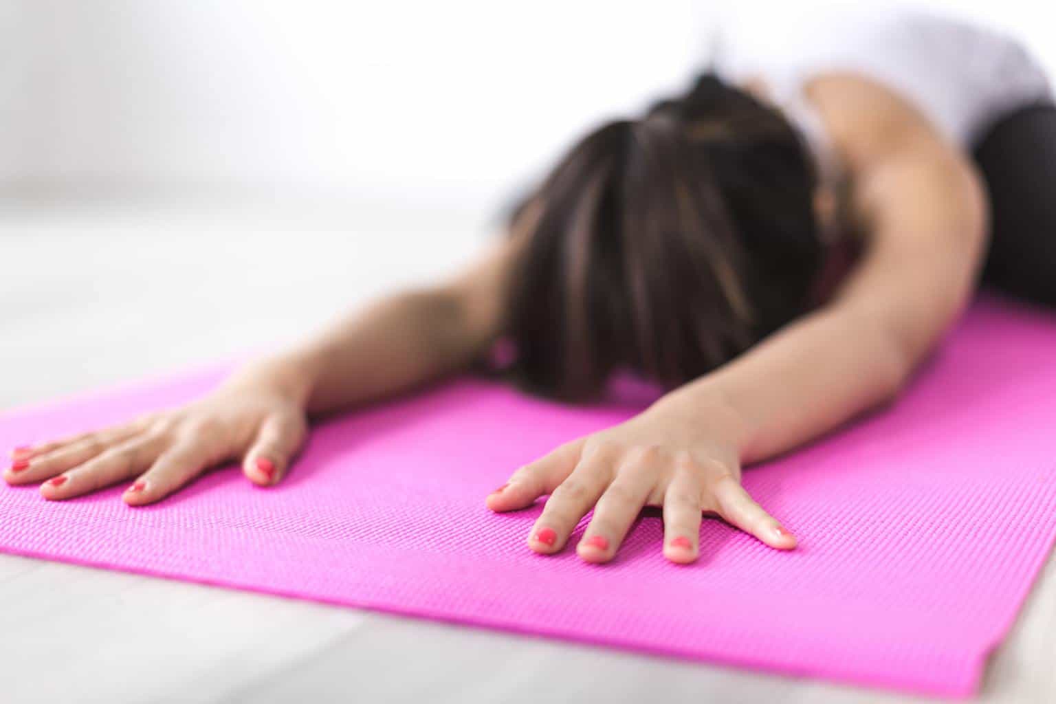 a woman on a yoga mat