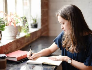 illustration of a woman taking notes of calories