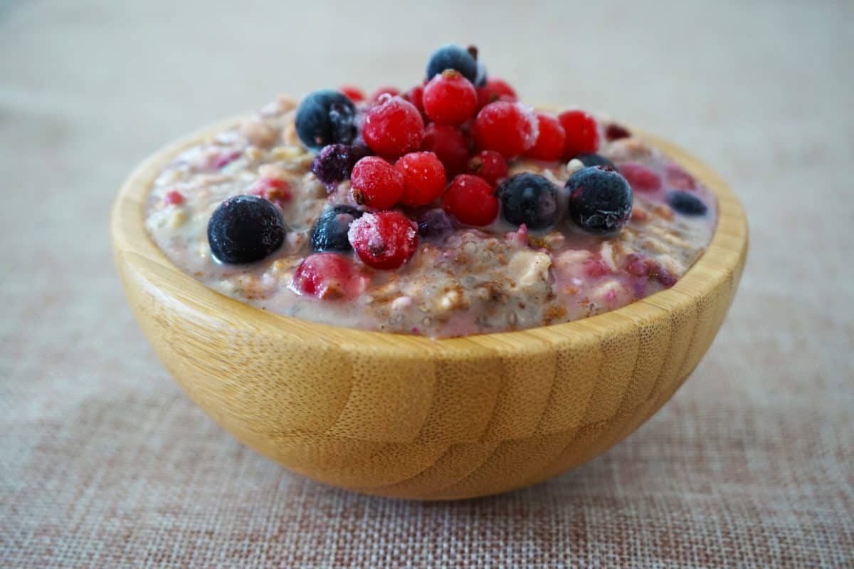 bowl of oatmeal blueberries and raspberries